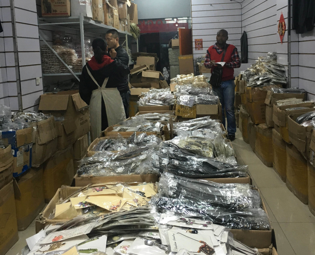 African customer is placing order in shop