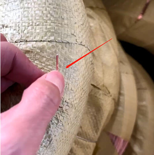 copper wires sticking out of the packaging