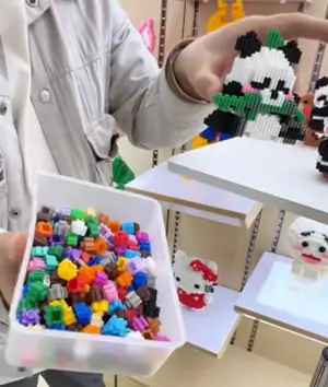 Toys built with factory-standard building blocks